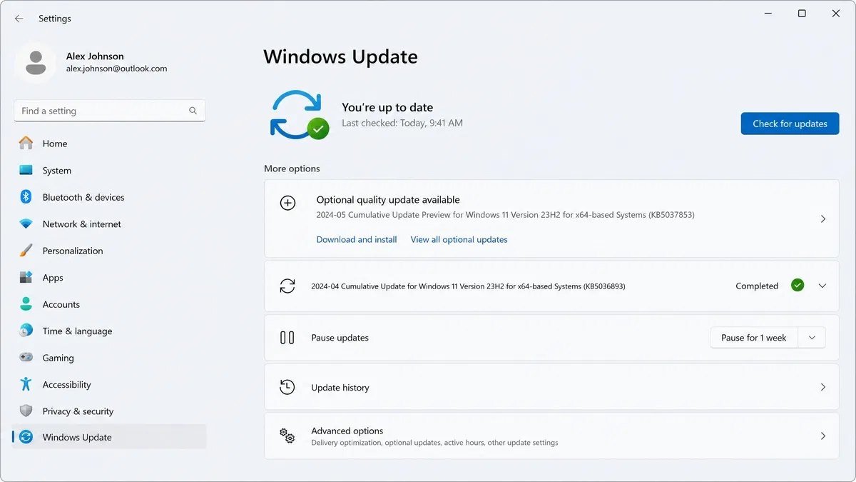 Windows Update screen showing an optional update available with a download and install link next to a completed monthly quality update
